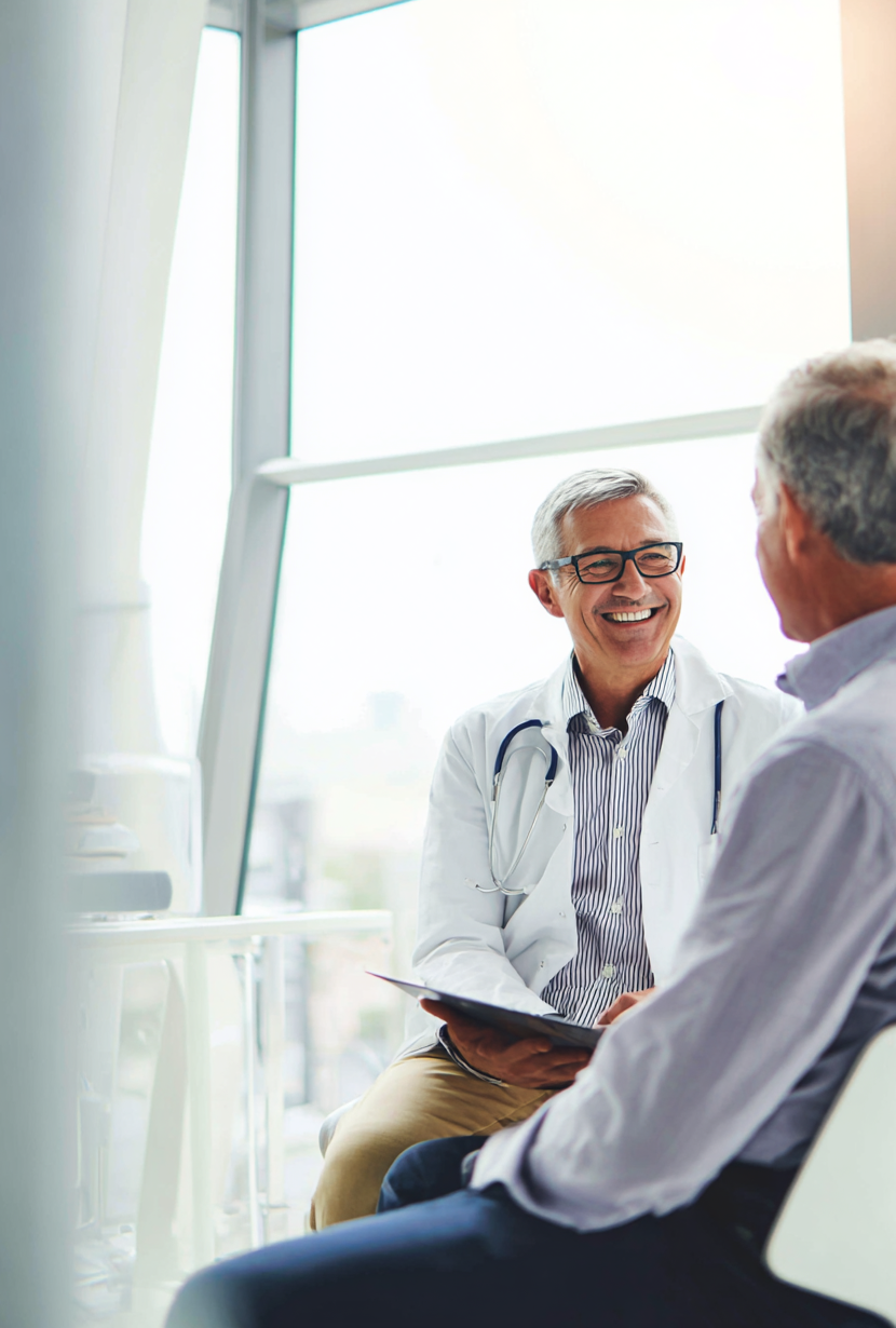 d_135447_Male_patient_in_his_50s_talking_with_a_kind_professi_a5b9a9e5-2803-45bf-8823-4e3d69a7ba1a_1